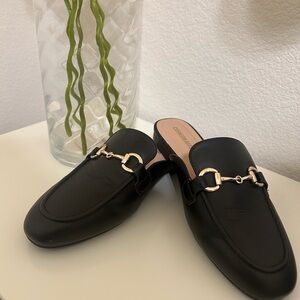 Chic Black Mules with Gold Accents